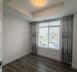 Main floor 1 Bedroom + 1 Den stacked Townhouse