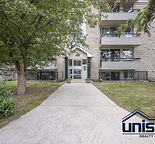 Charming 1-Bedroom Condo with Spacious Kitchen & Assigned Parking