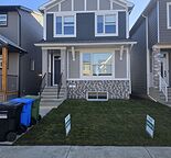 Large 4 brms + 3 baths + 1 flex room main floor unit in vibrant Seton Community
