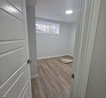 Cozy 2 bedroom with 1 bath and spacious living room with kitchen area.