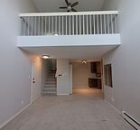 Spacious 2-Bedroom Condo with Loft, 17' Ceilings, Balcony & In-Suite Laundry.