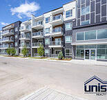 Spacious Top Floor 2 Bedroom Condo at Belmont Plaza