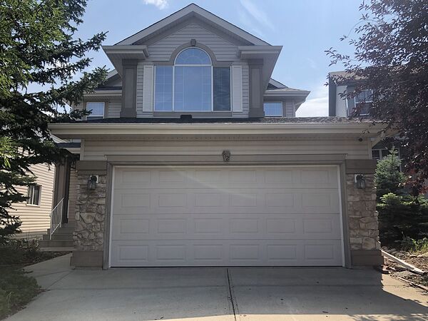 2-Story Front Drive Garage Backing onto a Greenbelt & Pathway