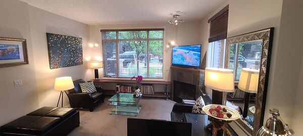 PETS OK | BRIDGELAND CORNER WALK-OUT | 2 BED + 2 BATH | HEATED SECURE PARKING