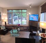 BRIDGELAND CORNER WALK-OUT | 2 BED + 2 BATH | SPACIOUS | HEATED SECURE PARKING