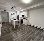 Modern 2 bed condo in private Lake community