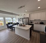 Show-Home Quality Fully Furnished Walkout Legal Suite w/ Scenic Pond Views!
