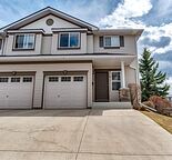 Spacious 3 Bed+2.5 Bath End-Unit Townhome with Walkout Basement in Rocky Ridge!