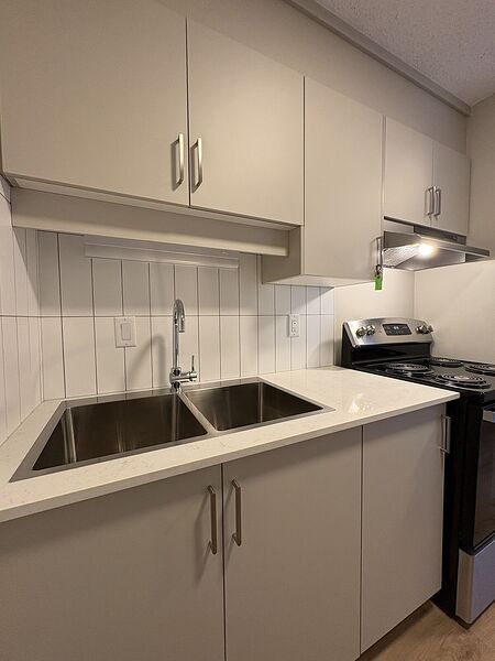 INCLUSIVE 1 BED + DEN WITH UPDATED SPECS