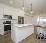 Spacious South-Facing 2 Bedroom Condo in Skyview Ranch