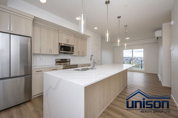 Top-Floor Brand-New 2-Bedroom, 2-Bathroom Unit with Underground Parking & A/C