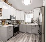 3 Bedrooms, 1.5 Bath Upper suite with shared laundry
