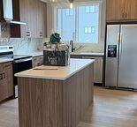 Bright 3 Bedroom + Den Duplex in Starling, NW Calgary. Available Now