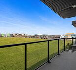 Modern 2 Bed + 2 Bath Condo in Seton – balcony overlooking green space