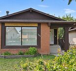 Bungalow Main Floor for Rent in Falconridge NE, Fireplace and Laundry