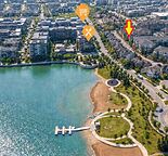 RARE TOP-FLOOR CONDO | STEPS TO LAKE | HEATED UNDERGROUND PARKING+STORAGE