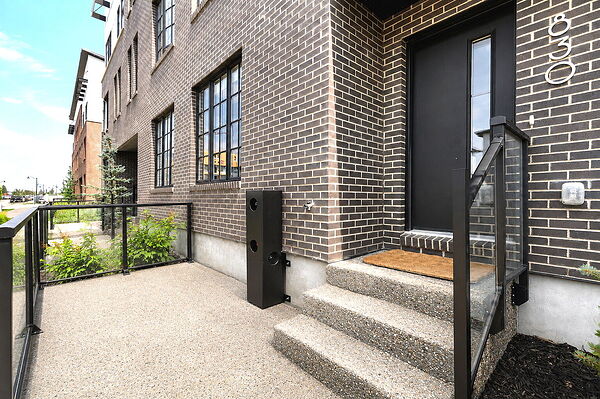 Stylish 3-Bedroom West District Townhome | 1,838 Sq.Ft. | Double Garage | Steps