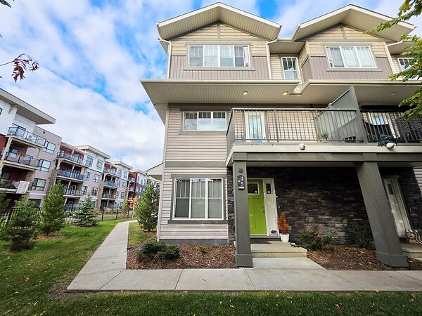 Bright Corner-Unit Townhouse with Balcony & Double Garage