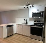 2 Bed/2 FULL Bath Lower Suite/Private Yard + Utilities Included