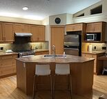 Beautiful bungalow backing onto green space/Attached over sized double garage