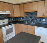4Plex lower unit. 2 bedrooms with private in-suite laundry.