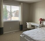 A Private Furnished Master Bedroom Near South Health Campus in Auburn Bay